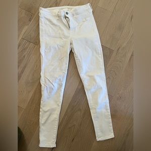AE Hi Rise next level stretch white skinny jeans